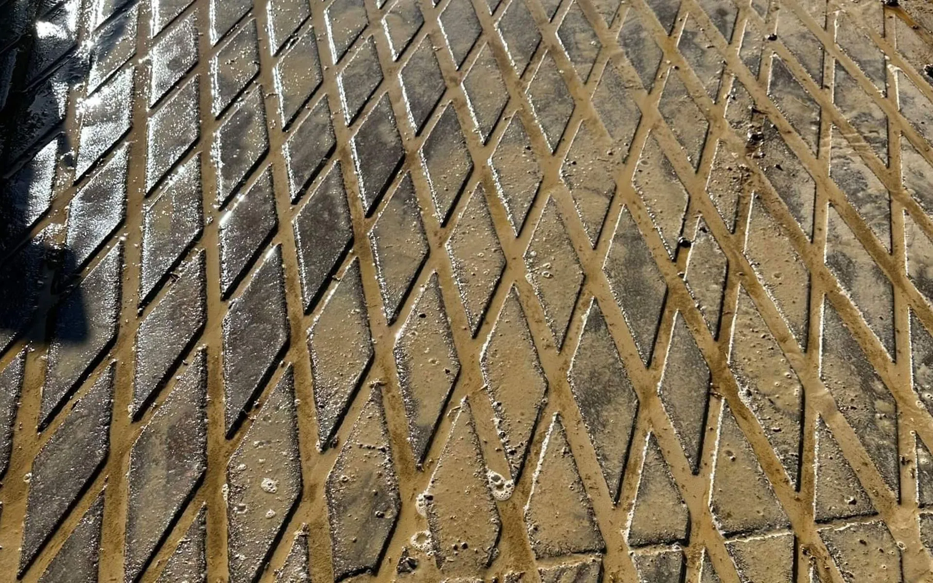 Cow yard safety grooving